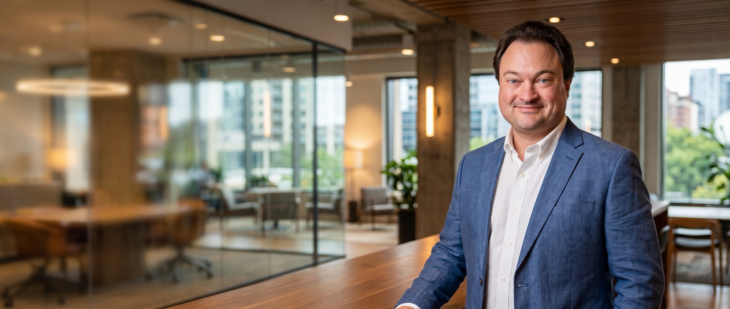 Dave Nelson standing in a modern office